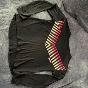 Girls Justice size 12 long sleeve black shirt with neon V stripes.